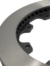 Load image into Gallery viewer, Zoomed picture of a brake rotor showing internal cooling vanes and mounting tabs