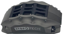 Load image into Gallery viewer, Hard anodized StopTech 6-piston trophy truck brake caliper on a white background
