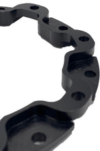 Load image into Gallery viewer, A black anodized rotor adapter on a white background