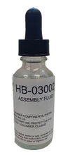 Load image into Gallery viewer, Small eyedropper bottle with an assembly fluid label
