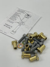 Load image into Gallery viewer, StopTech floating rotor pin kit pictured with an instruction sheet nearby