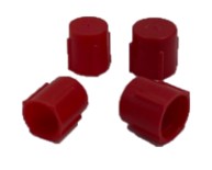 Group of (4) red plastic brake fitting caps on white background