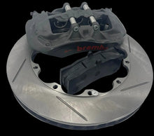 Load image into Gallery viewer, Brake disc with Brembo caliper on a white background
