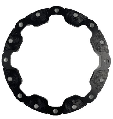 A black anodized rotor adapter on a white background