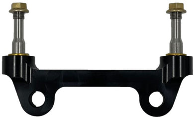 Side shot of a black radial mount caliper bracket on a white background